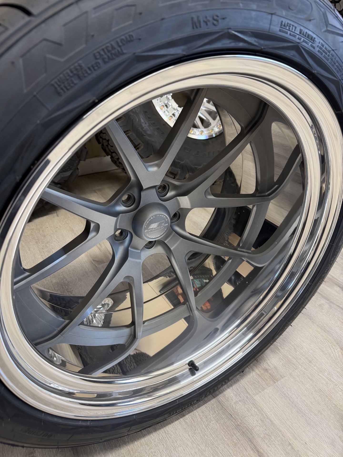 Billet Specialties 22" Prism step lip with Nitto tires, C10 fitment