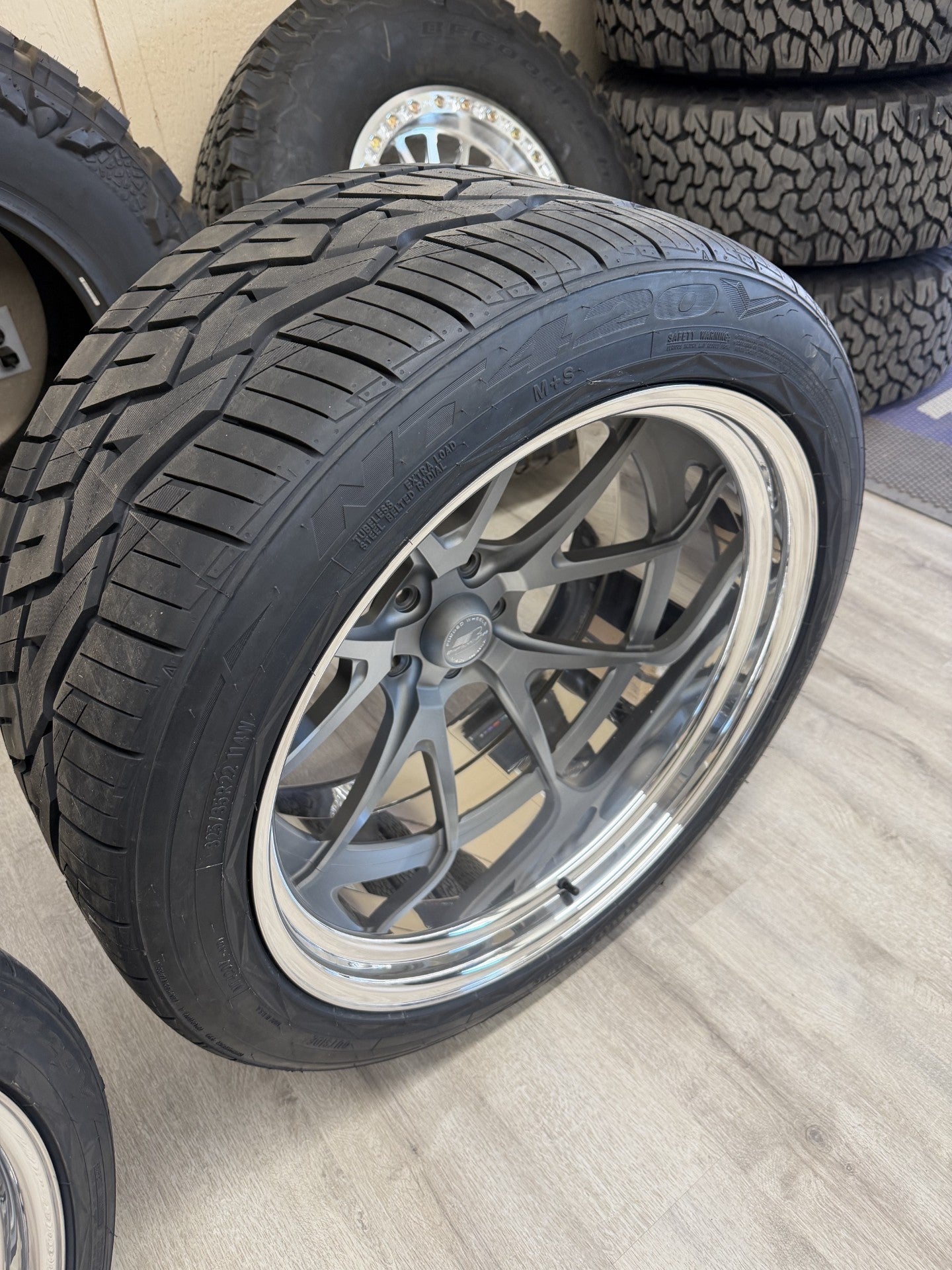 Billet Specialties 22" Prism step lip with Nitto tires, C10 fitment